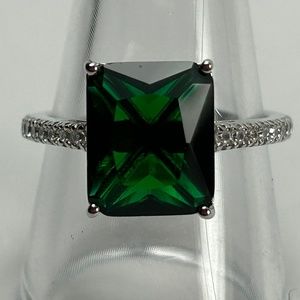 Sterling silver lab created emerald emerald cut ring with white sapphires